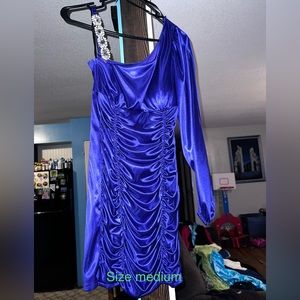 Purple silky dress that is form fitting